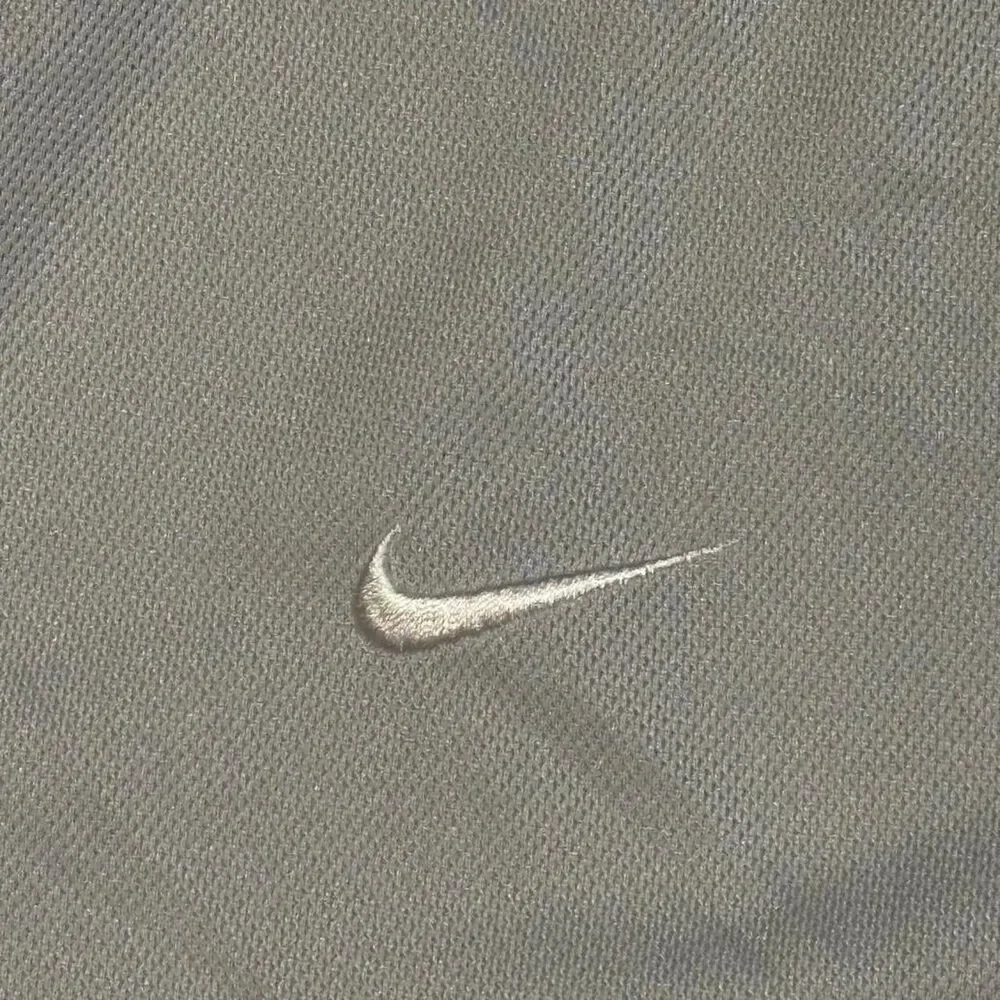 Nike Women's Grey and White T-shirt